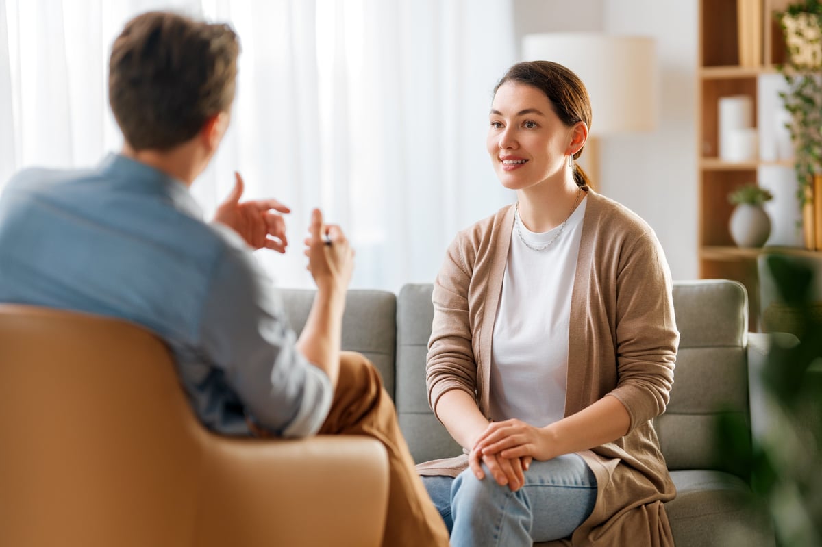 Consultation of young female patient on reception for psychologist